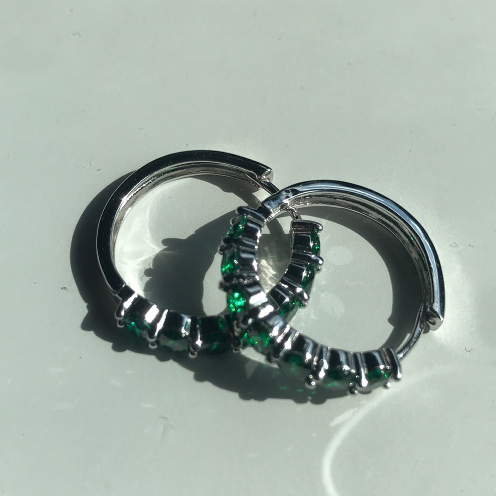Marked 925 silver hoop earrings with green stones